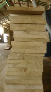 Aligned oak wood boards ready for cutting